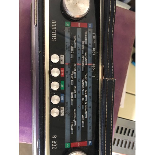 278 - Roberts R600 leather bound radio. C/w aerial