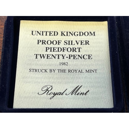 432 - Two boxed silver proof 20p coins, 1982, boxed with certificates