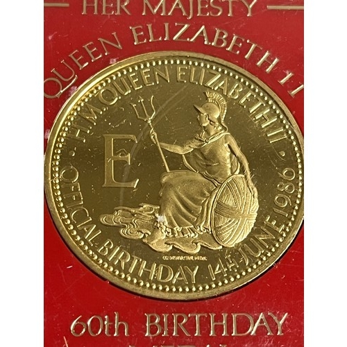 472 - Queen Elizabeth II 60th birthday medal uncirculated in plastic case,