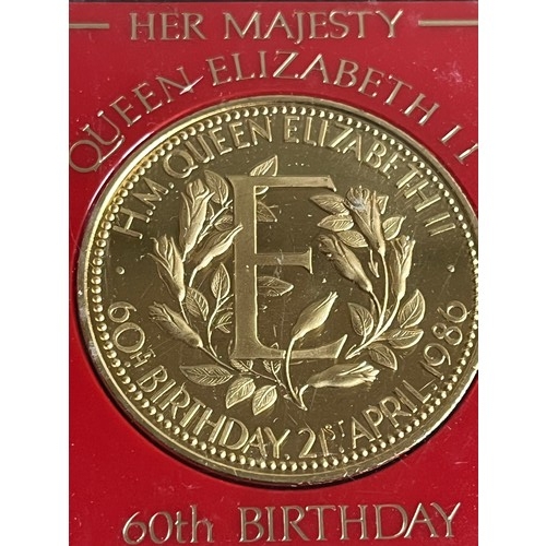 472 - Queen Elizabeth II 60th birthday medal uncirculated in plastic case,