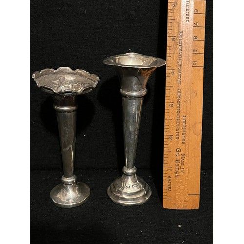 531 - Silver vases. Damaged for scrap. One with lead base 28.7g and the other with no weighted base 11.7g.... 