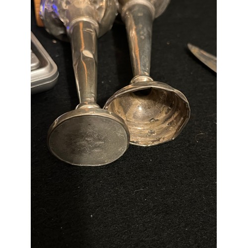 531 - Silver vases. Damaged for scrap. One with lead base 28.7g and the other with no weighted base 11.7g.... 