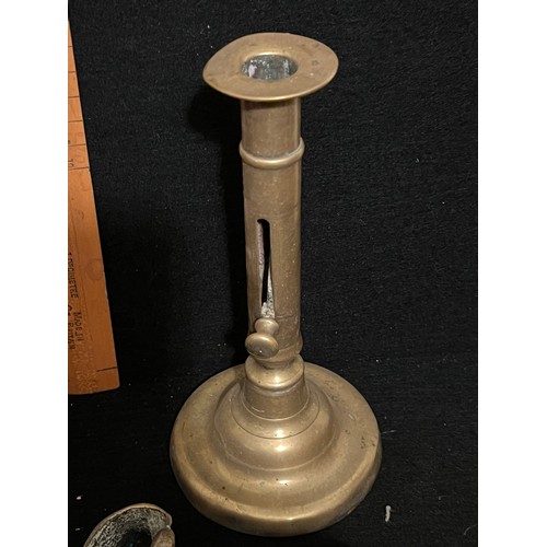 541 - Brass knickknacks. including a candlestick