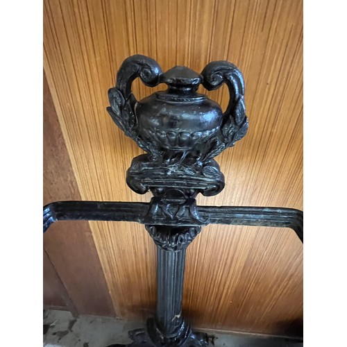 561 - Antique heavy cast iron stick stand and umbrella stand with tray.