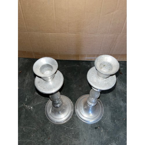 575 - Pair of aluminium candlesticks,