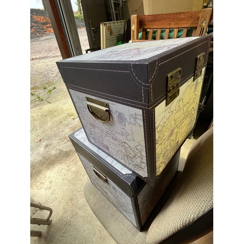 2 atlas map covered modern storage boxes.