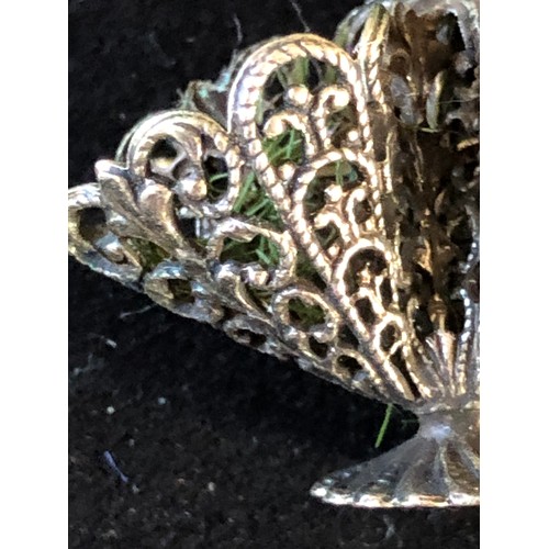 46 - White metal filigree basket brooch. Not assayed