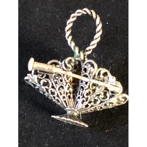 46 - White metal filigree basket brooch. Not assayed