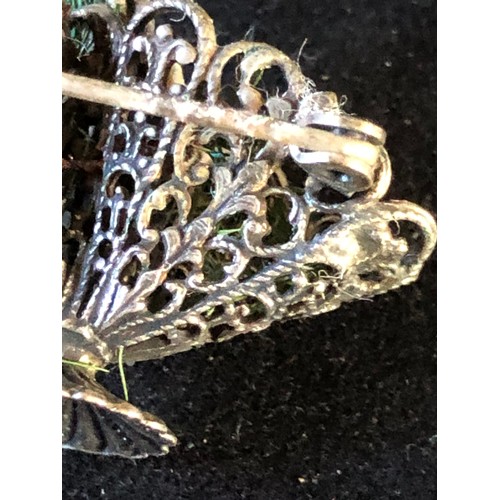 46 - White metal filigree basket brooch. Not assayed