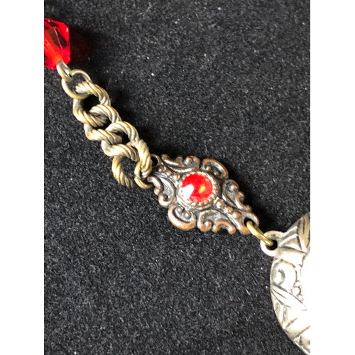 61 - 1920's Edwardian silver plated chain with a bright vermilion red crystal paste briolette suspended f... 