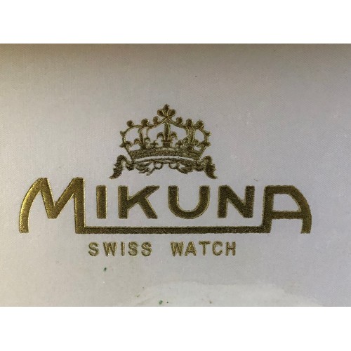 83 - Mikuna watch and accessories. Boxed