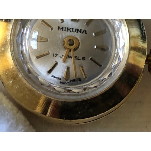 83 - Mikuna watch and accessories. Boxed