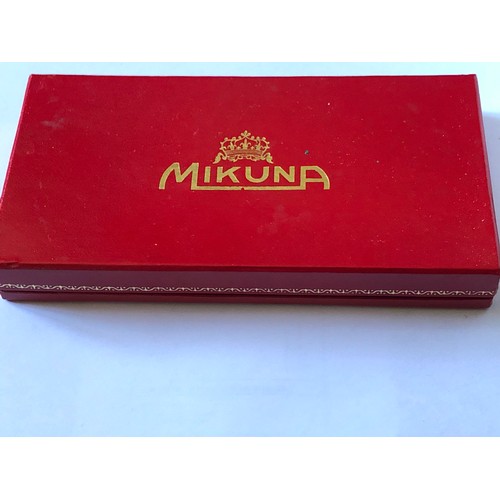 83 - Mikuna watch and accessories. Boxed