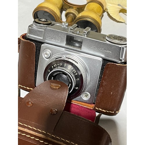 137 - Ilford Sportsman German camera along with a set of scales, opera glasses, nail clippers, a fan , fla... 