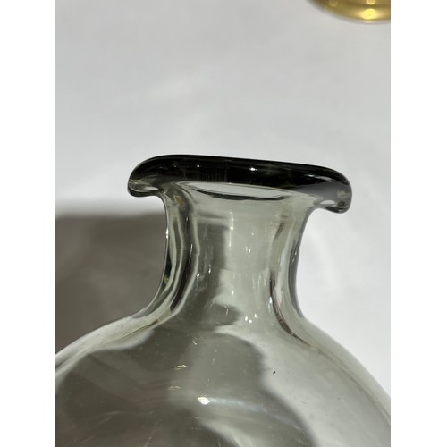 140 - Holmgaard doughnut shaped smoke glass decanter