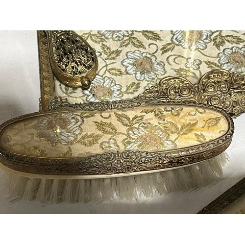 142 - Embroided antique gilt floral ladies brush set.