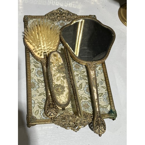 142 - Embroided antique gilt floral ladies brush set.