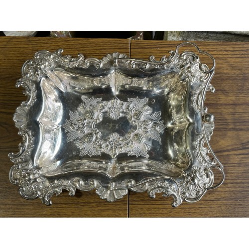 179 - Interesting fancy decorated silver plated handled serving tray with Reg. No. 497583 and old Sheffiel... 