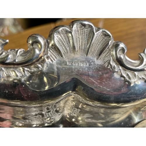 179 - Interesting fancy decorated silver plated handled serving tray with Reg. No. 497583 and old Sheffiel... 