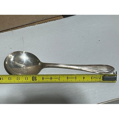 198 - Solid silver sugar spoon. EV Shefield Lion R date letter. Inscription