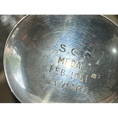 198 - Solid silver sugar spoon. EV Shefield Lion R date letter. Inscription