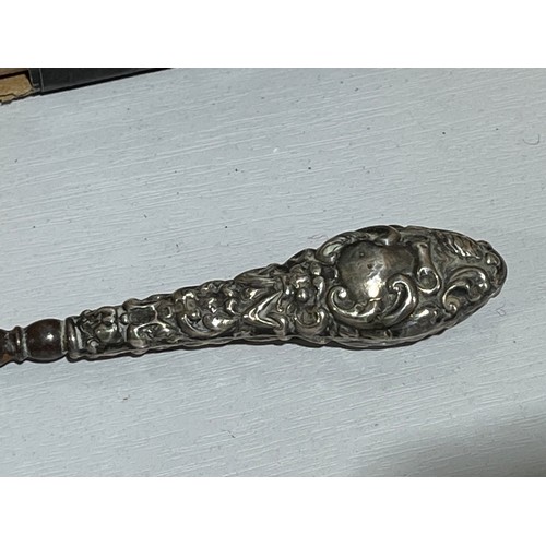 200 - Solid silver handled button hook. Birmingham Lion