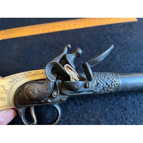 220 - Reproduction flintlock jouling pistol