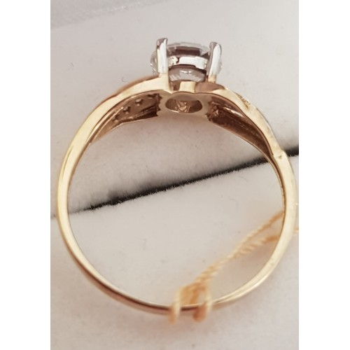 18 - 9ct yellow gold and cubic zirconias..size P