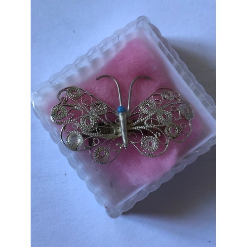 63 - Pretty silver coloured filigree butterfly brooch