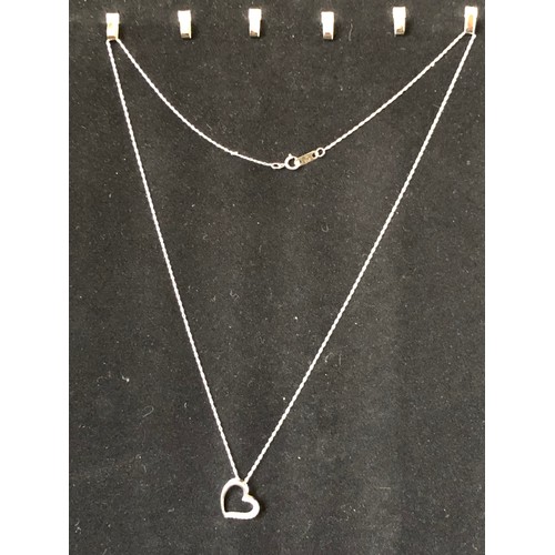 70 - White gold .375 necklace and white gold .375 diamond heart pendant