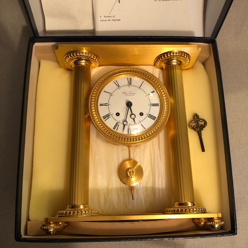 90 - Hour Lavigne French 4 kg clock with Swiss mechanism and key complete with original box and instructi... 