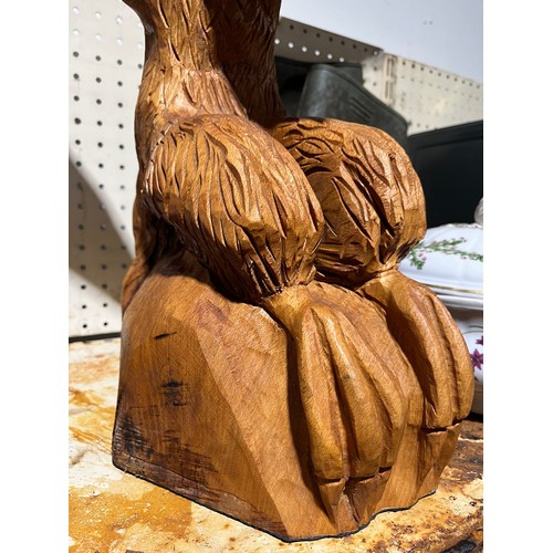 105 - Very large wooden tree carving of an Eagle.