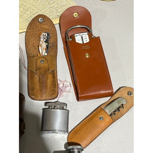 135 - Ilford Sportsman German camera along with a set of scales, opera glasses, nail clippers, a fan , fla... 