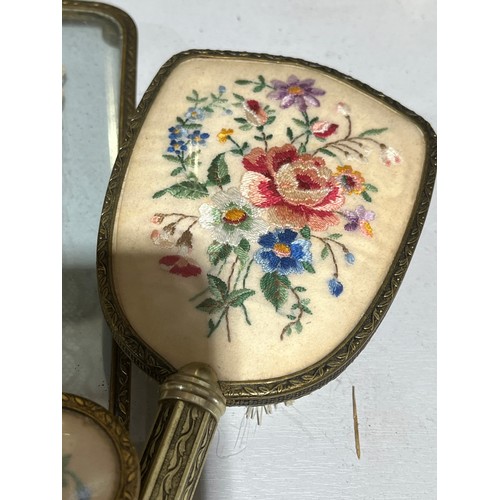 138 - Embroidery and lace antique floral ladies brush set.