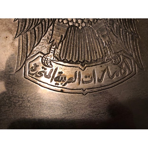 149 - Large and heavy United Arab Emirates white metal serving tray with Eagle embossed detail.