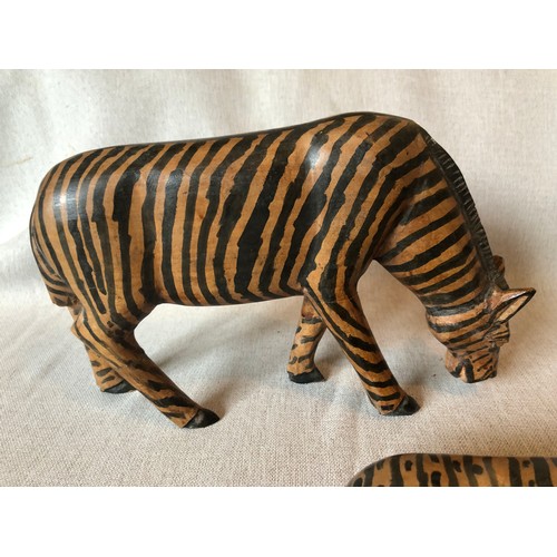 159 - A pair of hand carved wooden trbal art Zebras