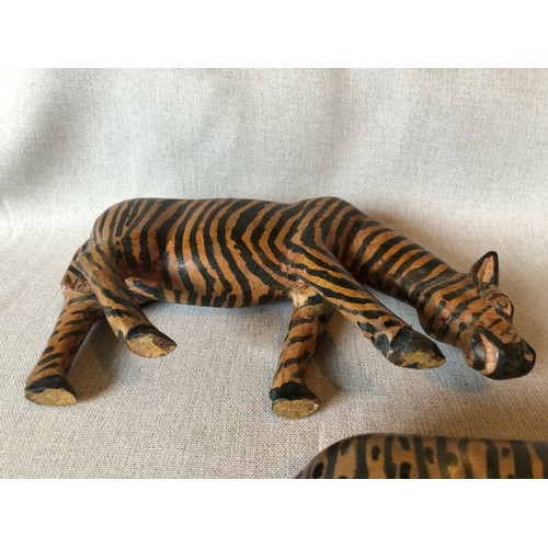 159 - A pair of hand carved wooden trbal art Zebras