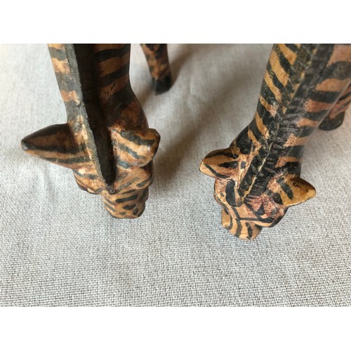 159 - A pair of hand carved wooden trbal art Zebras