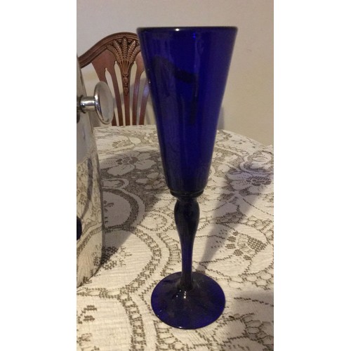 233 - Bristol, blue glass, signed, champagne, flutes And a vintage wine bottle, cooler