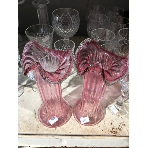 291 - Pair of art nouveau frilled cranberry glass vases
