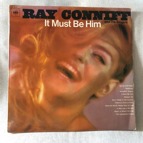 24 - Ray Conniff and the singers. It must be him. CBS63247