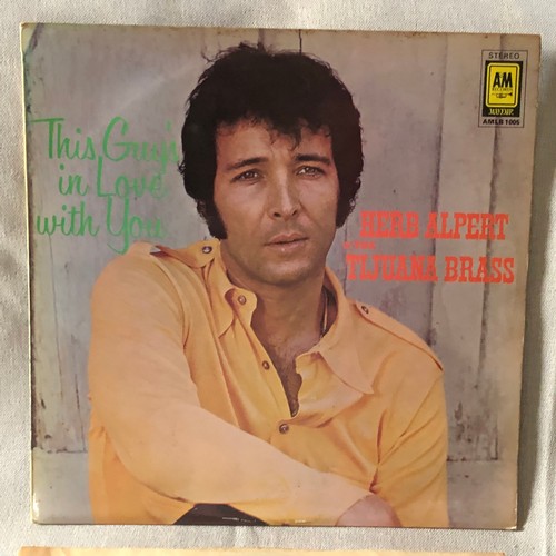 51 - Herb Alpert and the Tijuana brass. This guy is in love with you. AM Records Stereo AMLB 1005