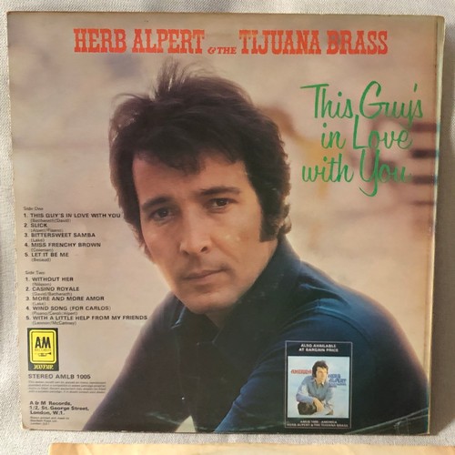 51 - Herb Alpert and the Tijuana brass. This guy is in love with you. AM Records Stereo AMLB 1005