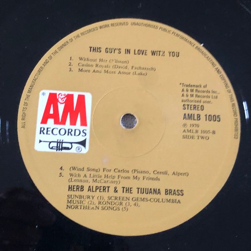 51 - Herb Alpert and the Tijuana brass. This guy is in love with you. AM Records Stereo AMLB 1005