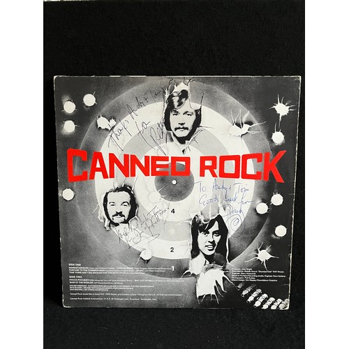 1034 - Signed album. Canned Rock. Also signed inside cover.