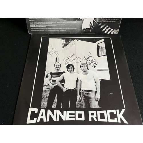 1034 - Signed album. Canned Rock. Also signed inside cover.