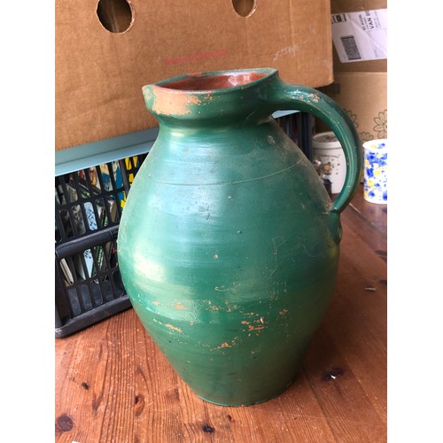 Large ceramic ewer with green glaze