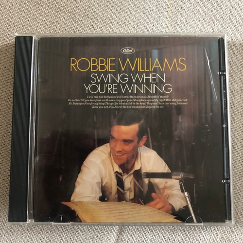 62 - Robbie Williams. Swing when you’re winning. CD