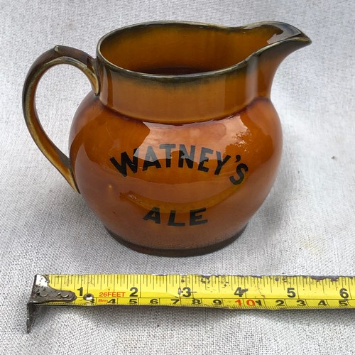 12 - Watney’s ale jug by James Green and nephew Limited London.