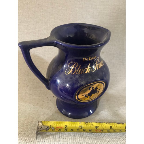 46 - Black Prince deluxe blended whisky jug by Buchan.